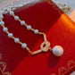 💜 Pearl Concentric Knot Necklace